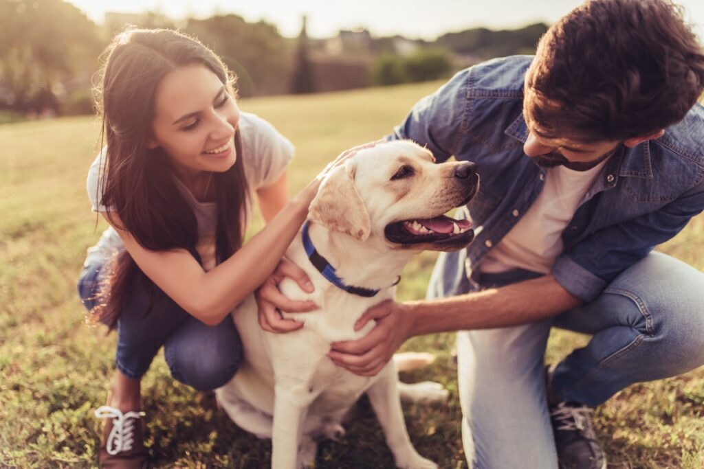 young couple with dog