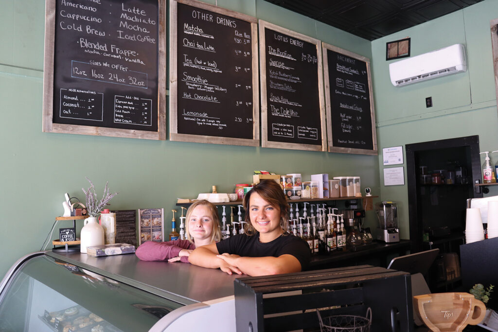 Rustic Roast Owner Brinley Byler, right, and her sister, Dakota, are ready to make your coffee wishes come true at the shop in Pennville.
